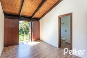 Casa em Condomínio à venda com 600m², 4 dormitórios, 4 suítes, 6 vagas, no bairro Cavalhada em PORTO ALEGRE