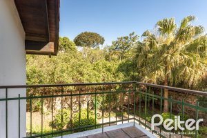 Casa em Condomínio à venda com 600m², 4 dormitórios, 4 suítes, 6 vagas, no bairro Cavalhada em PORTO ALEGRE