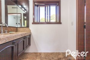 Casa em Condomínio à venda com 600m², 4 dormitórios, 4 suítes, 6 vagas, no bairro Cavalhada em PORTO ALEGRE