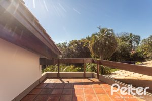 Casa em Condomínio à venda com 600m², 4 dormitórios, 4 suítes, 6 vagas, no bairro Cavalhada em PORTO ALEGRE