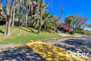 Casa em Condomínio à venda com 600m², 4 dormitórios, 4 suítes, 6 vagas, no bairro Cavalhada em PORTO ALEGRE