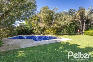 Casa em Condomínio à venda com 600m², 4 dormitórios, 4 suítes, 6 vagas, no bairro Cavalhada em PORTO ALEGRE