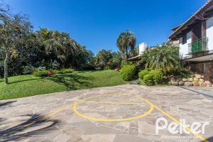 Casa em Condomínio à venda com 600m², 4 dormitórios, 4 suítes, 6 vagas, no bairro Cavalhada em PORTO ALEGRE