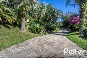 Casa em Condomínio à venda com 600m², 4 dormitórios, 4 suítes, 6 vagas, no bairro Cavalhada em PORTO ALEGRE