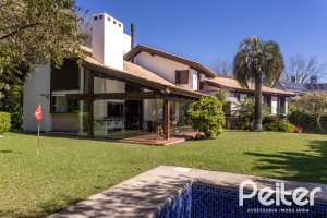 Casa em Condomínio à venda com 600m², 4 dormitórios, 4 suítes, 6 vagas, no bairro Cavalhada em PORTO ALEGRE