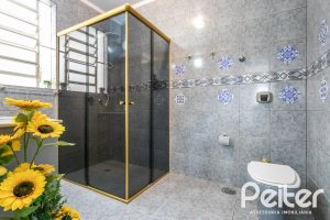 Casa em Condomínio à venda com 198m², 3 dormitórios, 1 suíte, 3 vagas, no bairro Ipanema em Porto Alegre