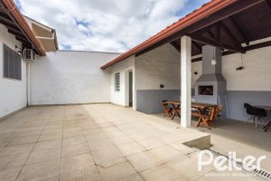 Casa em Condomínio à venda com 198m², 3 dormitórios, 1 suíte, 3 vagas, no bairro Ipanema em Porto Alegre