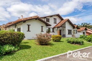 Casa em Condomínio à venda com 198m², 3 dormitórios, 1 suíte, 3 vagas, no bairro Ipanema em Porto Alegre