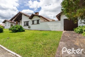 Casa em Condomínio à venda com 198m², 3 dormitórios, 1 suíte, 3 vagas, no bairro Ipanema em Porto Alegre