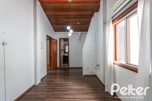 Casa em Condomínio à venda com 198m², 3 dormitórios, 1 suíte, 3 vagas, no bairro Ipanema em Porto Alegre