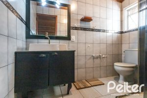 Casa em Condomínio à venda com 198m², 3 dormitórios, 1 suíte, 3 vagas, no bairro Ipanema em Porto Alegre