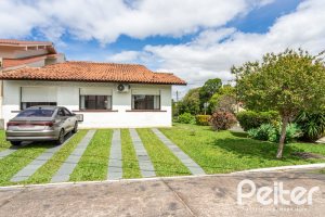 Casa em Condomínio à venda com 198m², 3 dormitórios, 1 suíte, 3 vagas, no bairro Ipanema em Porto Alegre