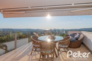 Casa em Condomínio à venda com 379m², 3 dormitórios, 1 suíte, 3 vagas, no bairro Nonoai em Porto Alegre