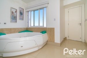 Casa em Condomínio à venda com 379m², 3 dormitórios, 1 suíte, 3 vagas, no bairro Nonoai em Porto Alegre