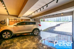 Casa em Condomínio à venda com 379m², 3 dormitórios, 1 suíte, 3 vagas, no bairro Nonoai em Porto Alegre