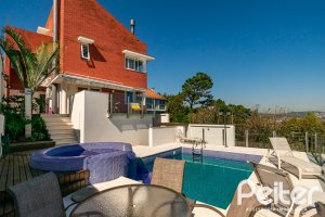 Casa em Condomínio à venda com 379m², 3 dormitórios, 1 suíte, 3 vagas, no bairro Nonoai em Porto Alegre