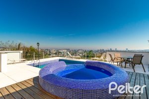 Casa em Condomínio à venda com 379m², 3 dormitórios, 1 suíte, 3 vagas, no bairro Nonoai em Porto Alegre