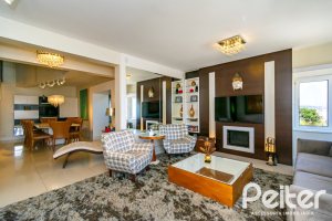 Casa em Condomínio à venda com 379m², 3 dormitórios, 1 suíte, 3 vagas, no bairro Nonoai em Porto Alegre