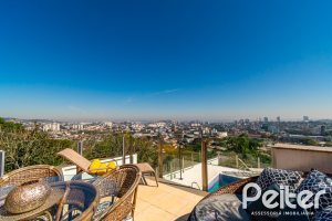 Casa em Condomínio à venda com 379m², 3 dormitórios, 1 suíte, 3 vagas, no bairro Nonoai em Porto Alegre