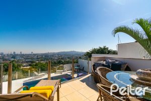 Casa em Condomínio à venda com 379m², 3 dormitórios, 1 suíte, 3 vagas, no bairro Nonoai em Porto Alegre