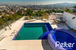 Casa em Condomínio à venda com 379m², 3 dormitórios, 1 suíte, 3 vagas, no bairro Nonoai em Porto Alegre