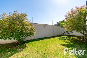 Casa em Condomínio à venda com 379m², 3 dormitórios, 1 suíte, 3 vagas, no bairro Nonoai em Porto Alegre