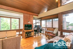 Casa em Condomínio à venda com 226m², 3 dormitórios, 2 suítes, 2 vagas, no bairro Vila Assunção em Porto Alegre