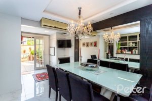 Casa em Condomínio à venda com 153m², 3 dormitórios, 1 suíte, 2 vagas, no bairro Tristeza em Porto Alegre