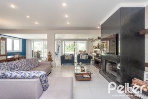 Casa em Condomínio à venda com 233m², 3 dormitórios, 3 suítes, 4 vagas, no bairro Terra Ville em PORTO ALEGRE