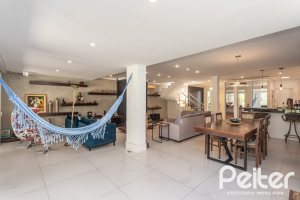 Casa em Condomínio à venda com 233m², 3 dormitórios, 3 suítes, 4 vagas, no bairro Terra Ville em PORTO ALEGRE