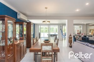 Casa em Condomínio à venda com 233m², 3 dormitórios, 3 suítes, 4 vagas, no bairro Terra Ville em PORTO ALEGRE