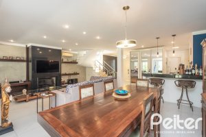 Casa em Condomínio à venda com 233m², 3 dormitórios, 3 suítes, 4 vagas, no bairro Terra Ville em PORTO ALEGRE