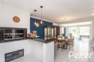 Casa em Condomínio à venda com 233m², 3 dormitórios, 3 suítes, 4 vagas, no bairro Terra Ville em PORTO ALEGRE