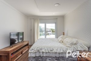 Casa em Condomínio à venda com 233m², 3 dormitórios, 3 suítes, 4 vagas, no bairro Terra Ville em PORTO ALEGRE