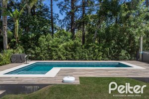 Casa em Condomínio à venda com 233m², 3 dormitórios, 3 suítes, 4 vagas, no bairro Terra Ville em PORTO ALEGRE