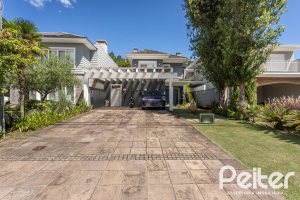 Casa em Condomínio à venda com 233m², 3 dormitórios, 3 suítes, 4 vagas, no bairro Terra Ville em PORTO ALEGRE