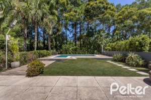 Casa em Condomínio à venda com 233m², 3 dormitórios, 3 suítes, 4 vagas, no bairro Terra Ville em PORTO ALEGRE