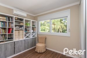 Casa em Condomínio à venda com 233m², 3 dormitórios, 3 suítes, 4 vagas, no bairro Terra Ville em PORTO ALEGRE