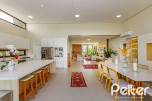 Casa em Condomínio à venda com 370m², 3 dormitórios, 3 suítes, 4 vagas, no bairro Terra Ville em PORTO ALEGRE