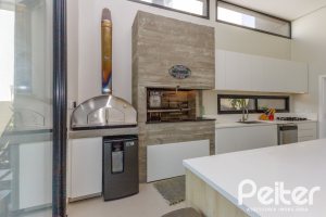 Casa em Condomínio à venda com 370m², 3 dormitórios, 3 suítes, 4 vagas, no bairro Terra Ville em PORTO ALEGRE