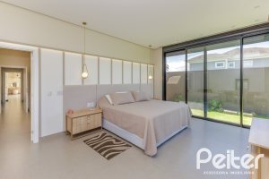 Casa em Condomínio à venda com 370m², 3 dormitórios, 3 suítes, 4 vagas, no bairro Terra Ville em PORTO ALEGRE