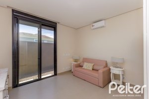 Casa em Condomínio à venda com 370m², 3 dormitórios, 3 suítes, 4 vagas, no bairro Terra Ville em PORTO ALEGRE