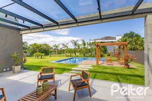 Casa em Condomínio à venda com 370m², 3 dormitórios, 3 suítes, 4 vagas, no bairro Terra Ville em PORTO ALEGRE