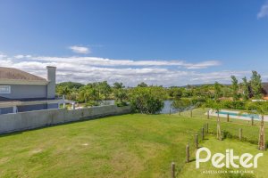Casa em Condomínio à venda com 370m², 3 dormitórios, 3 suítes, 4 vagas, no bairro Terra Ville em PORTO ALEGRE