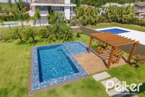 Casa em Condomínio à venda com 370m², 3 dormitórios, 3 suítes, 4 vagas, no bairro Terra Ville em PORTO ALEGRE