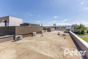 Casa em Condomínio à venda com 370m², 3 dormitórios, 3 suítes, 4 vagas, no bairro Terra Ville em PORTO ALEGRE