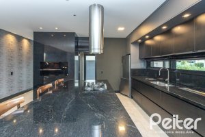 Casa em Condomínio à venda com 327m², 3 dormitórios, 3 suítes, 4 vagas, no bairro Terra Ville em PORTO ALEGRE