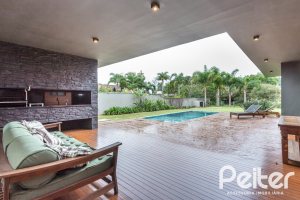 Casa em Condomínio à venda com 327m², 3 dormitórios, 3 suítes, 4 vagas, no bairro Terra Ville em PORTO ALEGRE