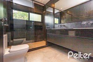 Casa em Condomínio à venda com 327m², 3 dormitórios, 3 suítes, 4 vagas, no bairro Terra Ville em PORTO ALEGRE