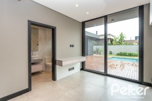 Casa em Condomínio à venda com 327m², 3 dormitórios, 3 suítes, 4 vagas, no bairro Terra Ville em PORTO ALEGRE